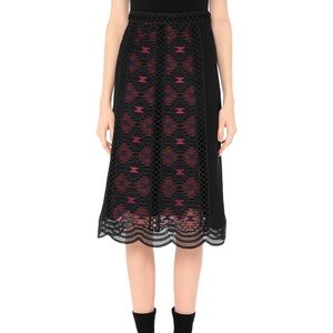 Never worn black pinko midi skirt with beautiful pattern design!